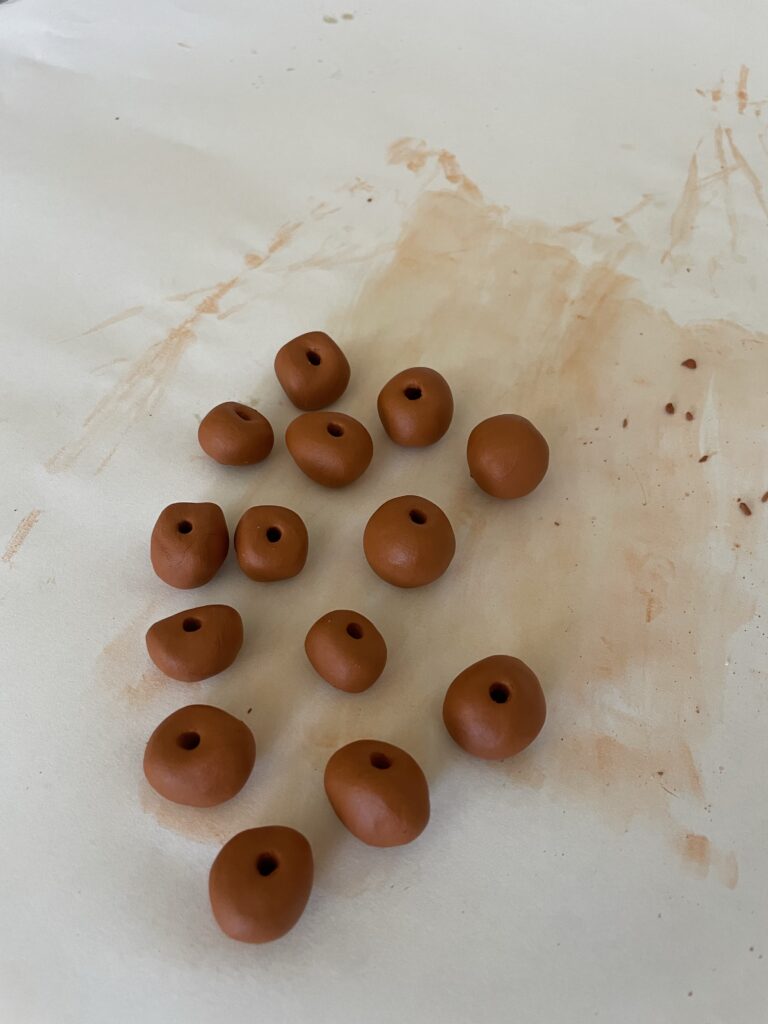 Make a DIY Terracotta Bead Garland with Air Dry Clay - Perfecting Places